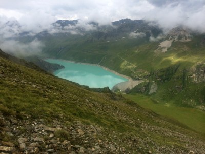 Clouds, lush tundra, cows and the Moiry