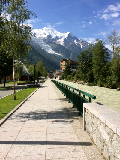 Prom. du Fori along the L'Arve leading to the city center in Chamonix. Mont Blanc overhead